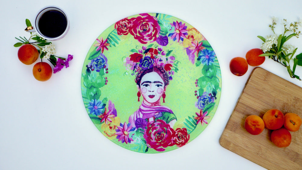 
            
                Load image into Gallery viewer, Frida Khalo Green Glass Worktop Saver - Chopping Board - Placemat - Kitsch Republic
            
        