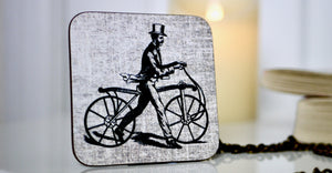 
            
                Load image into Gallery viewer, Vintage Victorian Man on Bike Coaster - Steampunk Collection - Kitsch Republic
            
        